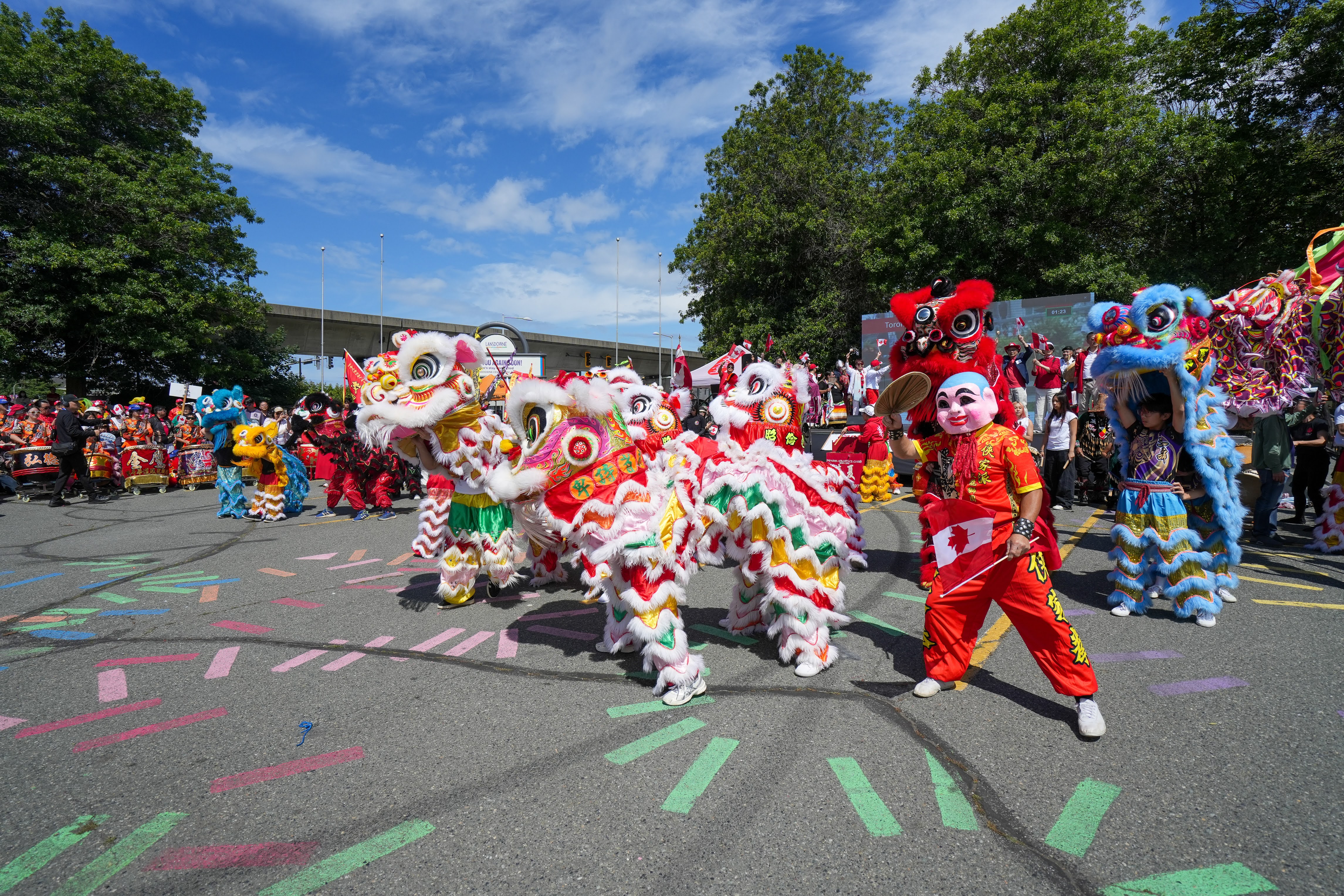 Lion dance performer mid-jump during a wedding ceremony performance